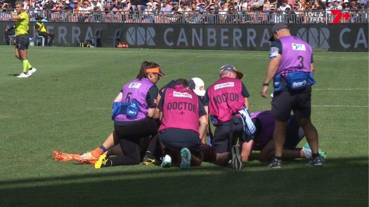 AFL match stopped as GWS player stretchered off with neck injury