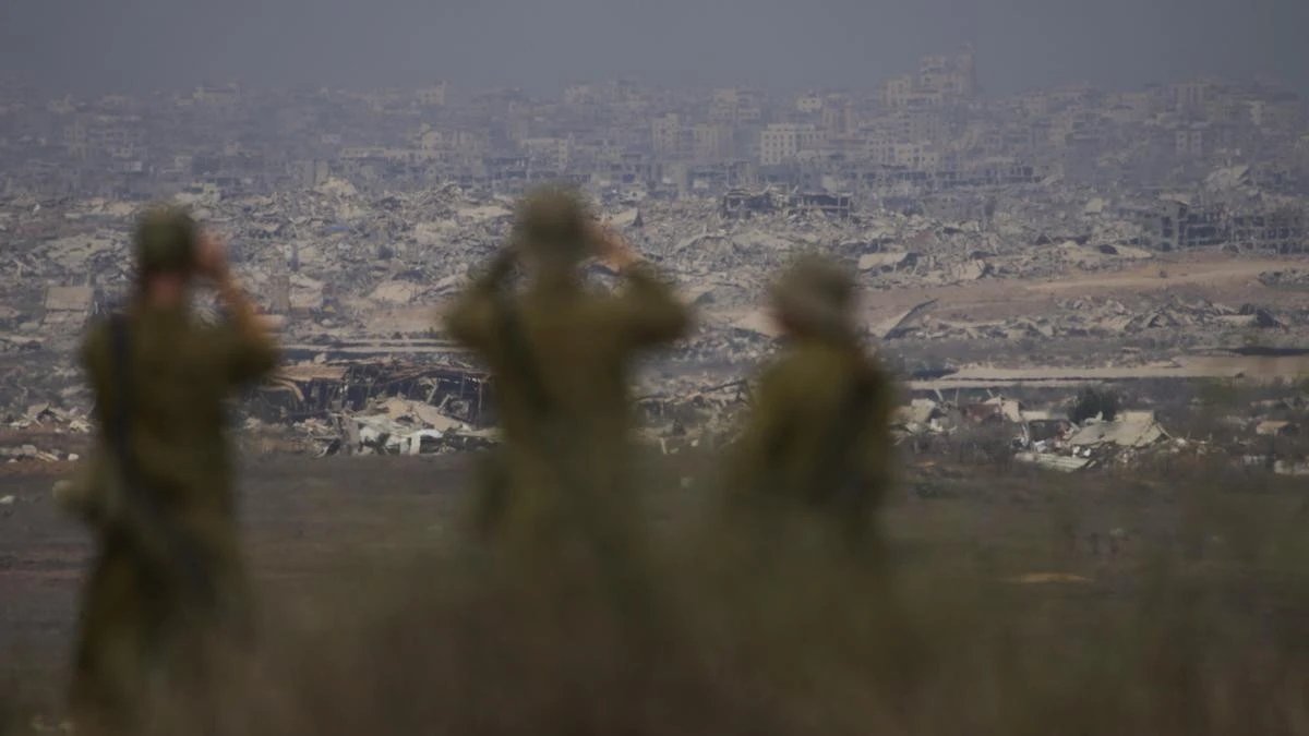 Israel says Gazans free to leave as Hamas mulls ceasefire