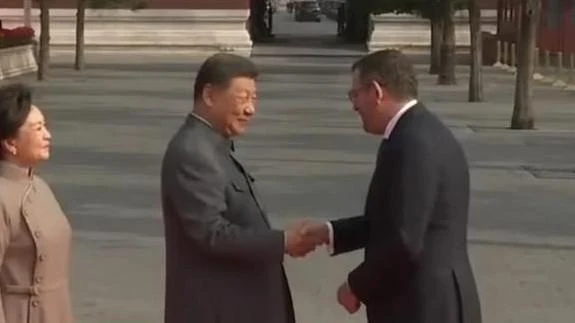 Former Victorian premier defends controversial Putin photo, China visit