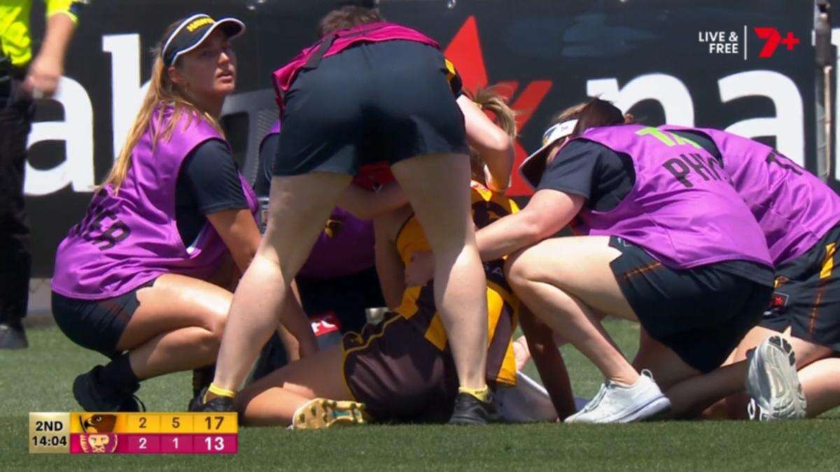 AFLW defender floored by crunching hit: ‘She’s not in a good way’