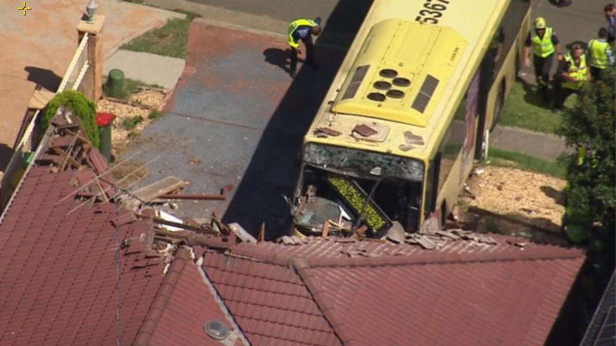 One injured as bus full of passengers crashes into house in Sydney