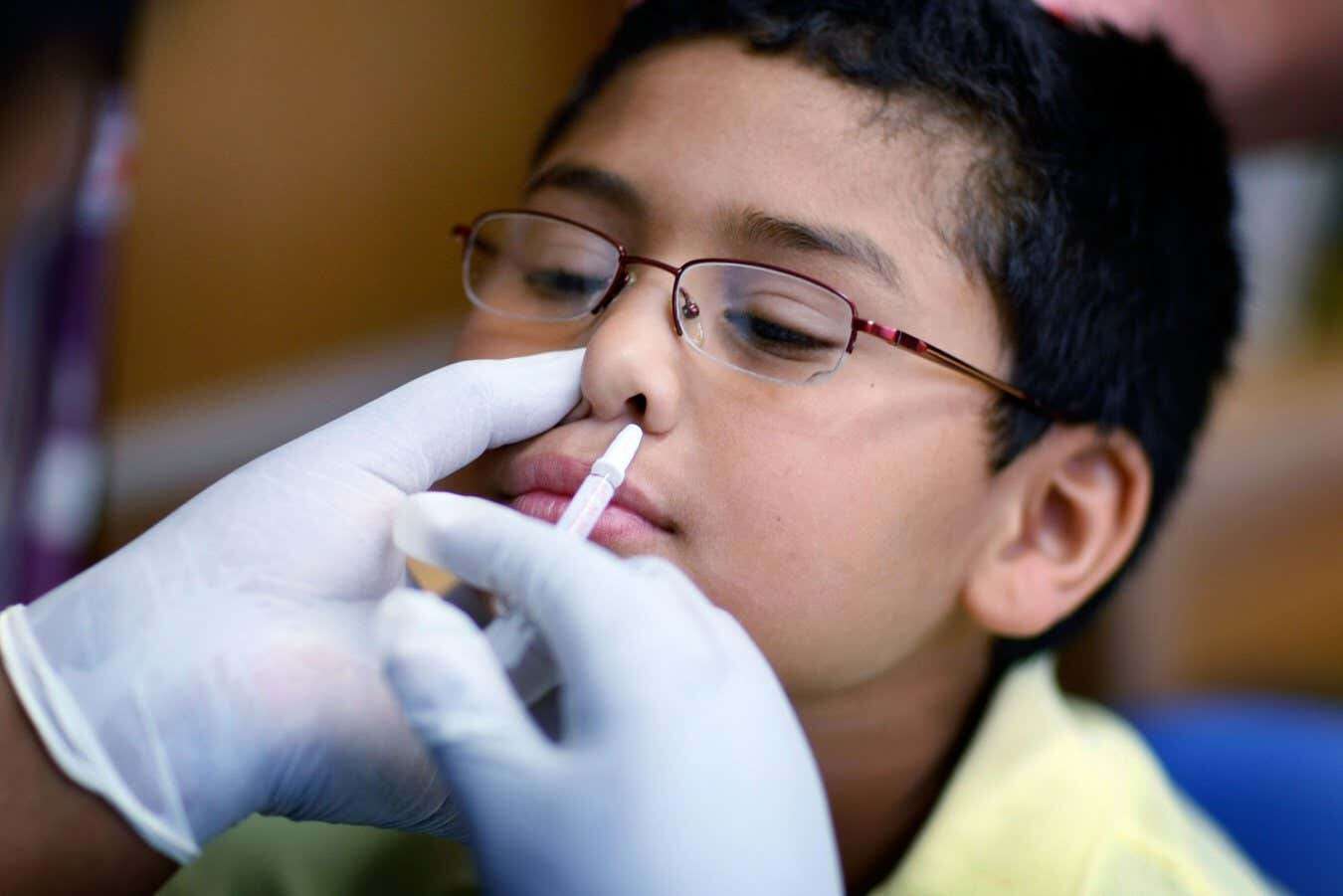 Flu vaccine for children linked to pneumonia risk for their relatives