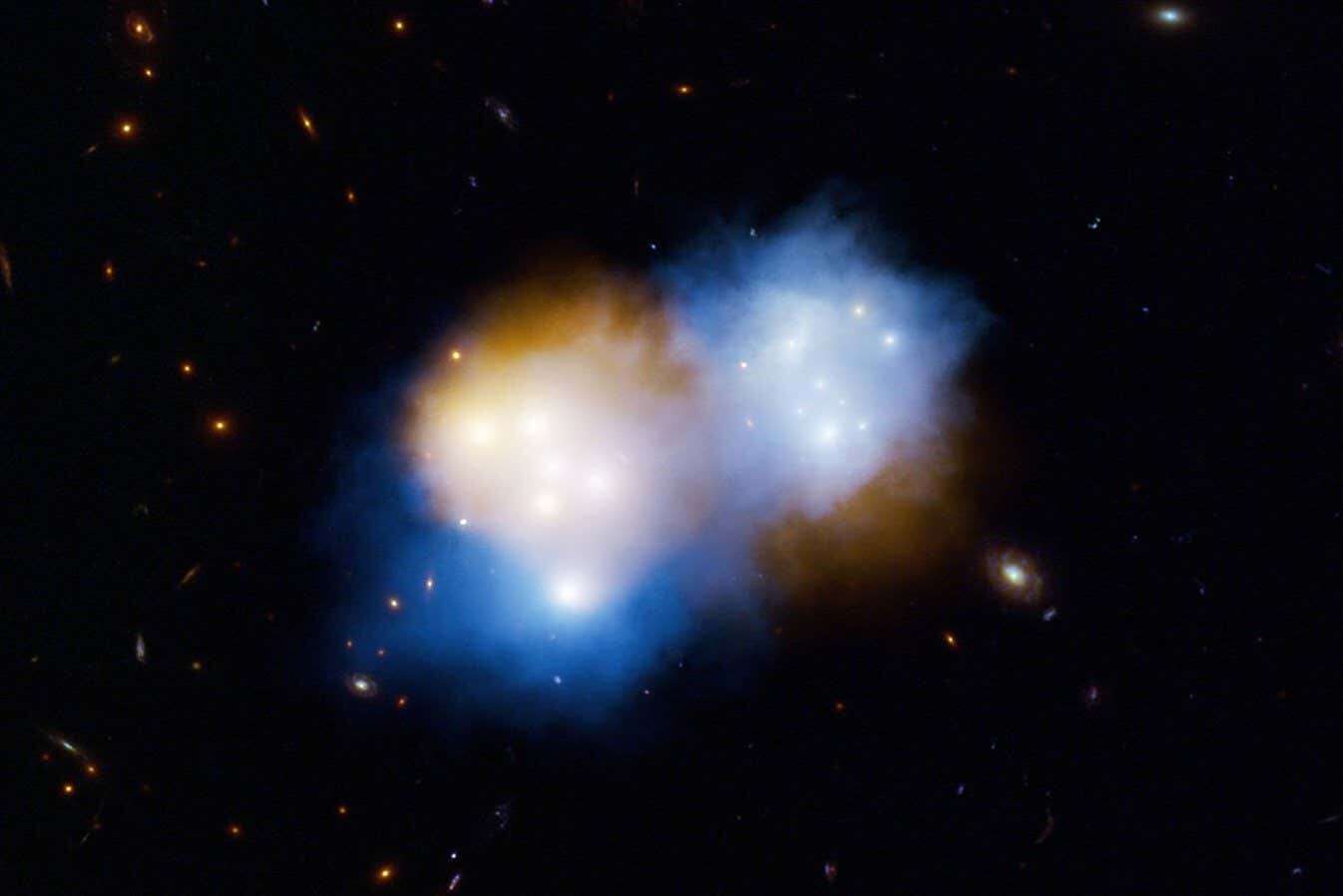 Galaxy cluster smash-up lets us observe dark matter on its own