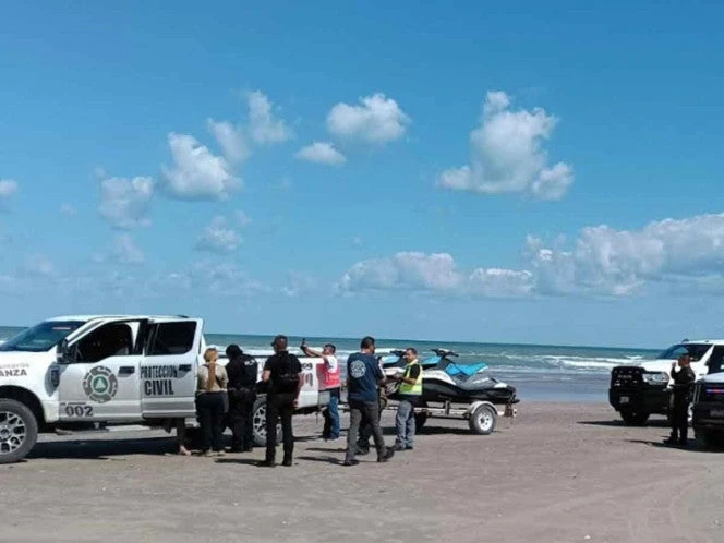 Entrenador fallece en el Golfo de Mexico al tratar de rescatar a su hijo que había sido arrastrado por la corriente