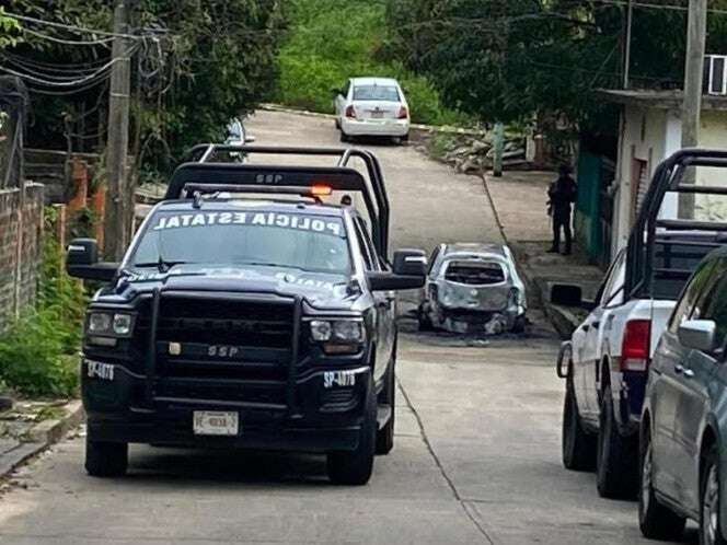 Hallan cuerpo calcinado al interior de un taxi en Veracruz