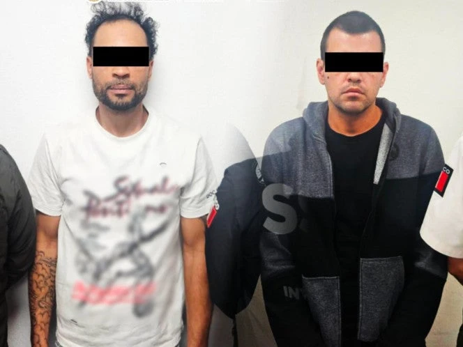 Detienen en CDMX a 2 buscados por EU por fraude de vehículos