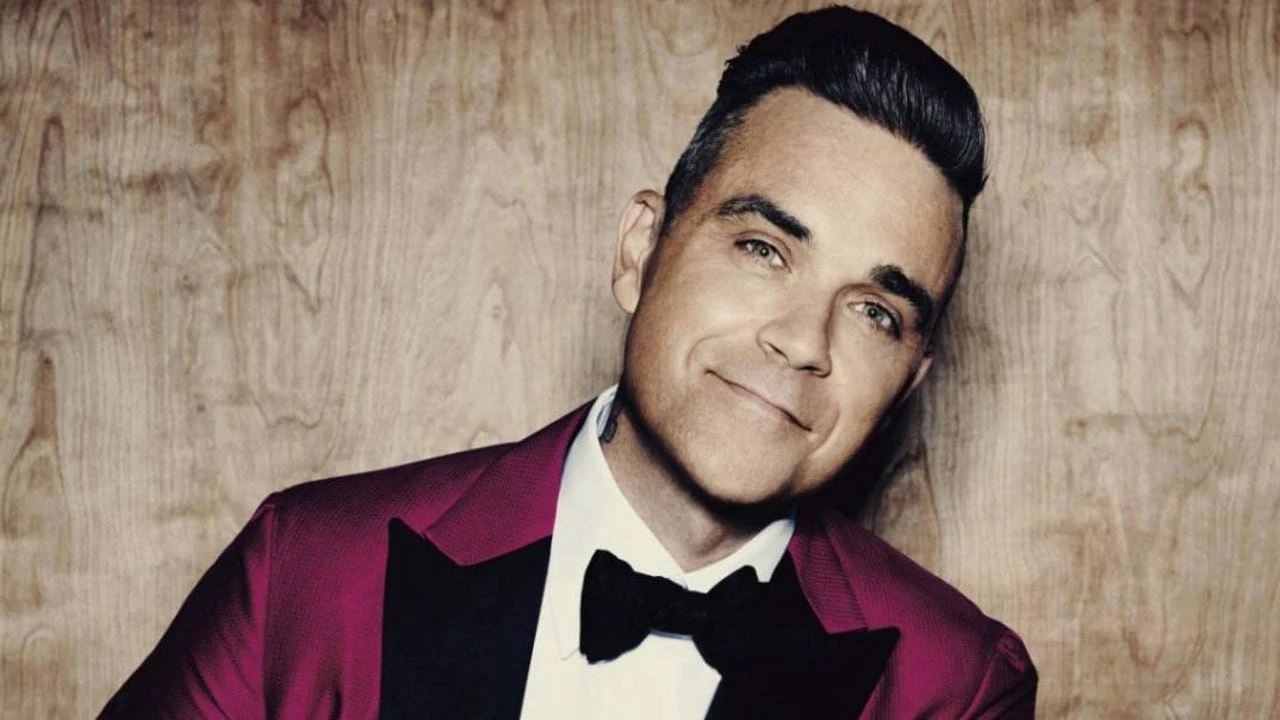 Robbie Williams desata la risa (y el desconcierto) de Julia Roberts con una confesión surrealista