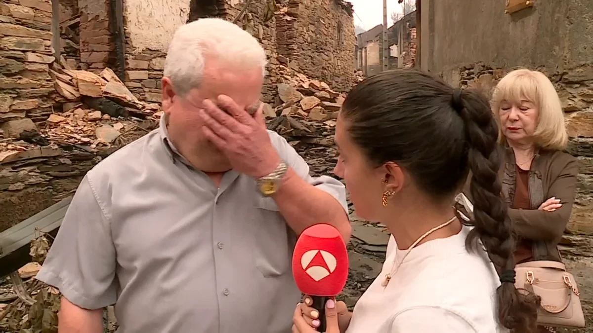 Un hombre se derrumba al ver su pueblo arrasado por el fuego y abraza a una reportera de Antena 3 Noticias