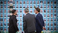 Зеленський та лідери Франції і Британії поклали квіти до Стіни пам’яті полеглих за Україну