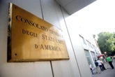 Lavoratori indiani sfruttati per costruire il consolato Usa a Milano: controllo giudiziario per il colosso Caddell Construction