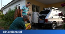 Coches con carbón y cocinas solares: así sobreviven los cubanos a la espera de Trump