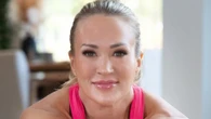 Carrie Underwood fans ‘hardly recognize’ singer as she promotes her fitness app fit52 with a workout photo