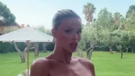 Brooks Nader spills out of extremely plunging see-through dress as she risks wardrobe malfunction on France trip
