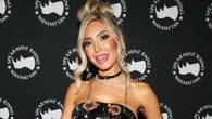 Teen Mom Farrah Abraham shows off bare butt in thong bikini while sunbathing with her puppy