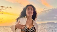 Salma Hayek, 58, spills out of tiny green bikini and displays fit figure for shoot as fans insist she’s ‘still got it!’