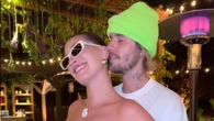 Hailey Bieber rubs her growing bump in sweet new video with husband Justin at lavish bash just before due date