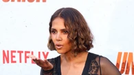 Halle Berry, 58, deemed ‘hottest woman alive’ in plunging dress with longer hair after drastic change for Netflix film