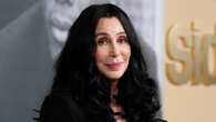 Cher, 77, debuts bold new look as she packs on PDA with boyfriend Alexander Edwards, 38, at glam cocktail party in Paris