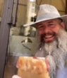 Nineties film star with TWO huge movie hits unrecognizable with bushy beard on day out in LA – do you know who he is?