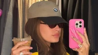 Hailey Bieber shares new photos of growing baby bump at Rhode headquarters as fans gush over update