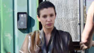 Bianca Censori exits tanning salon in sheer trench coat as her family grows more concerned about marriage to Kanye West