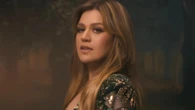 Kelly Clarkson shows off 40-lb. weight loss in skintight plunging sparkle catsuit for new music video