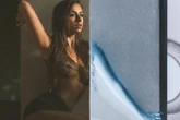 Tate McRae looks incredible in see-through net top and hot pants as she teases music video