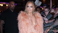 J-Lo, 55, wows as she goes braless in plunging satin dress & shawl before changing into stunning white gown on night out