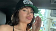 Kylie Jenner nearly pours out of ultra low-cut dress in new photos as fans accuse her of being ‘obsessed with herself’