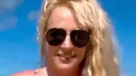 Britney Spears gets naked again on beach and admits she faced ‘struggles’ on vacation that are ‘too offensive to share’