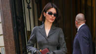 A-lister dons leather gloves and a suit for Hermes shopping spree while in Paris – can you tell who it is?