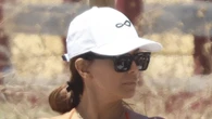 Eva Longoria, 50, puts her fit figure on display in a cheeky orange bikini on beach in Spain