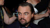 Leonardo DiCaprio hides in car while driving with two mystery women after he sparks engagement rumors with girlfriend