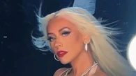 Christina Aguilera flashes her much-slimmer figure in nude bodysuit for rare backstage video after singer’s weight loss