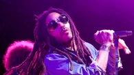 Lenny Kravitz, 60, leaves fans drooling with ‘perfect’ six-pack abs as he goes shirtless in just jeans and hair towel