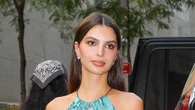 Emily Ratajkowski rocks plunging snakeskin minidress as she walks through NYC streets