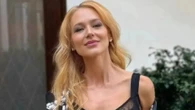 90s pop star, now 51, swaps modest style for racy black lace lingerie as fans say she looks ‘half her age’