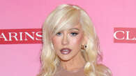 Christina Aguilera flaunts her major weight loss in sheer bustier and mini-skirt at Clarins launch party in LA