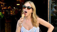 Heather Graham, 54, looks so young in plunging dress as star has getaway in Barcelona with boyfriend John de Neufville