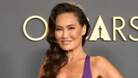90s hottie Tia Carrere, 58, looks half her age in a plunging violet gown more than 30 years after Wayne’s World fame