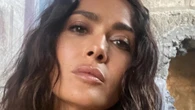 Salma Hayek, 57, shows off age-defying curves in tiny black bikini on beach as fans say they’re ‘obsessed’