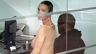 Bianca Censori sits on Kanye West’s lap at car dealership as pair browse vehicles including $120K Porsche 992 Carrera