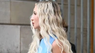 Kesha risks wardrobe malfunction as she ditches underwear and wears only a sheet at PFW