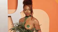 Megan Thee Stallion goes braless in daring dress for Oscars party – as Hailey Bieber walks red carpet without Justin