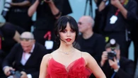 Jenna Ortega ditches basic black for scarlet red see-through gown at Beetlejuice premiere in Venice