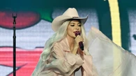 Shania Twain, 58, performs in tiny high-waisted white shorts and matching bra after fan backlash over tour wardrobe