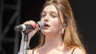 Nepo baby performs debut gig and famous dad and his Hollywood A-list pal join her onstage – can you guess who she is?