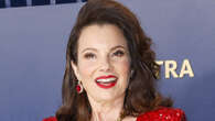 Fran Drescher, 66, leaves fans drooling with plunging tight red dress as The Nanny star stuns on SAG Awards red carpet