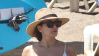 Eva Longoria, 49, looks ageless as she wears bikini and flexes her toned stomach during family vacation in Spain