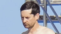 Tobey Maguire, 49, seen with mystery bikini-clad woman on yacht weeks after he was spotted with Lily Chee, 20, in NYC